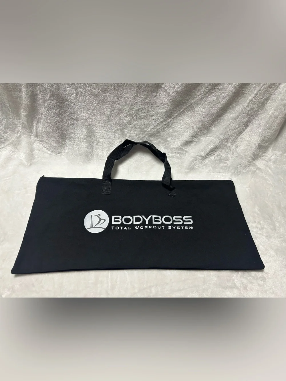 Large black zip up soft storage bag with handles